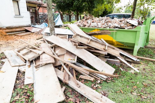 Waste clearance truck transporting construction debris