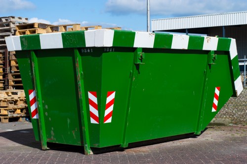 Overview of segregated commercial waste containers on a street